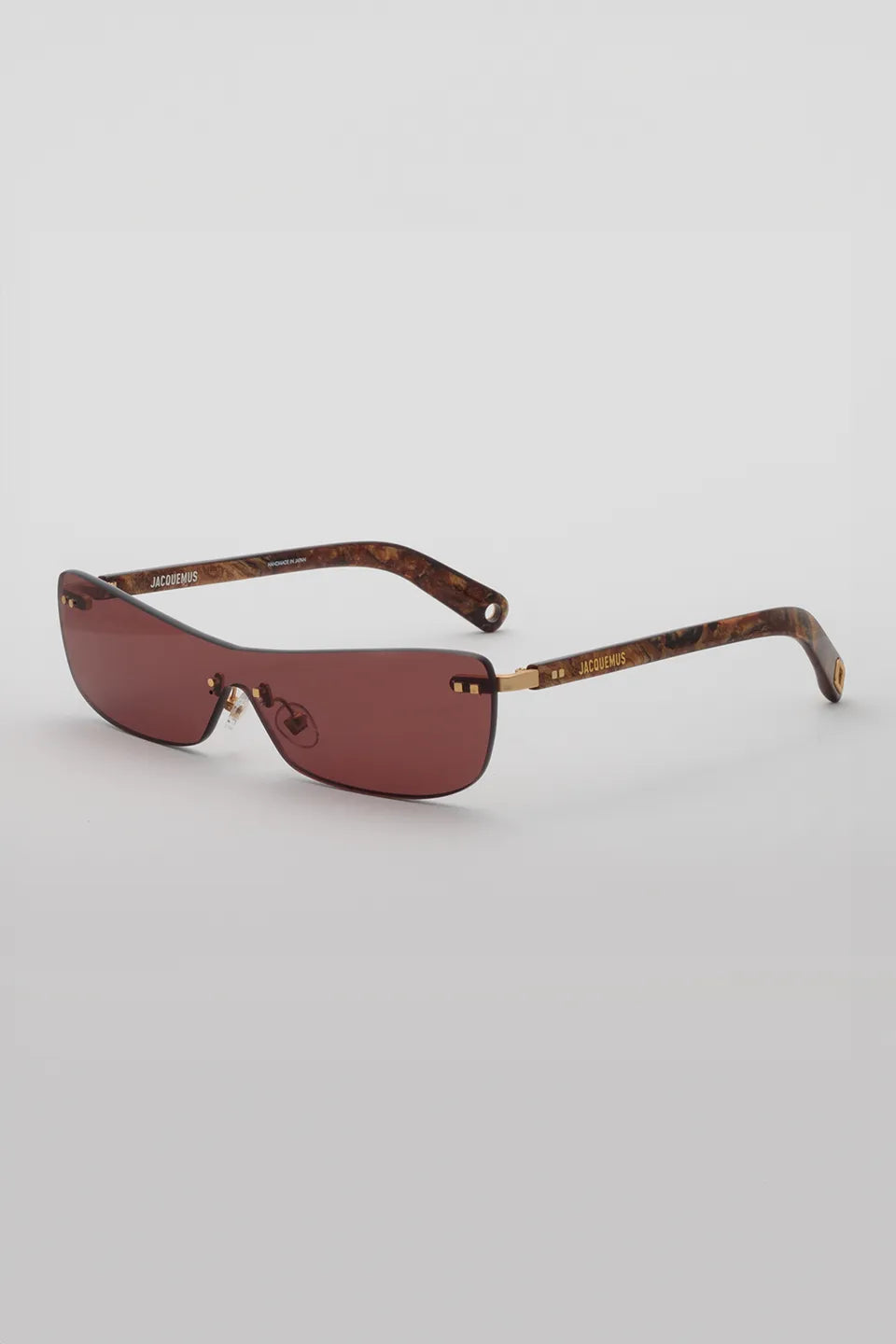 Shop online trendy Burgundy Sunglasses from Jacquemus Fashion designer. Product gallery 1