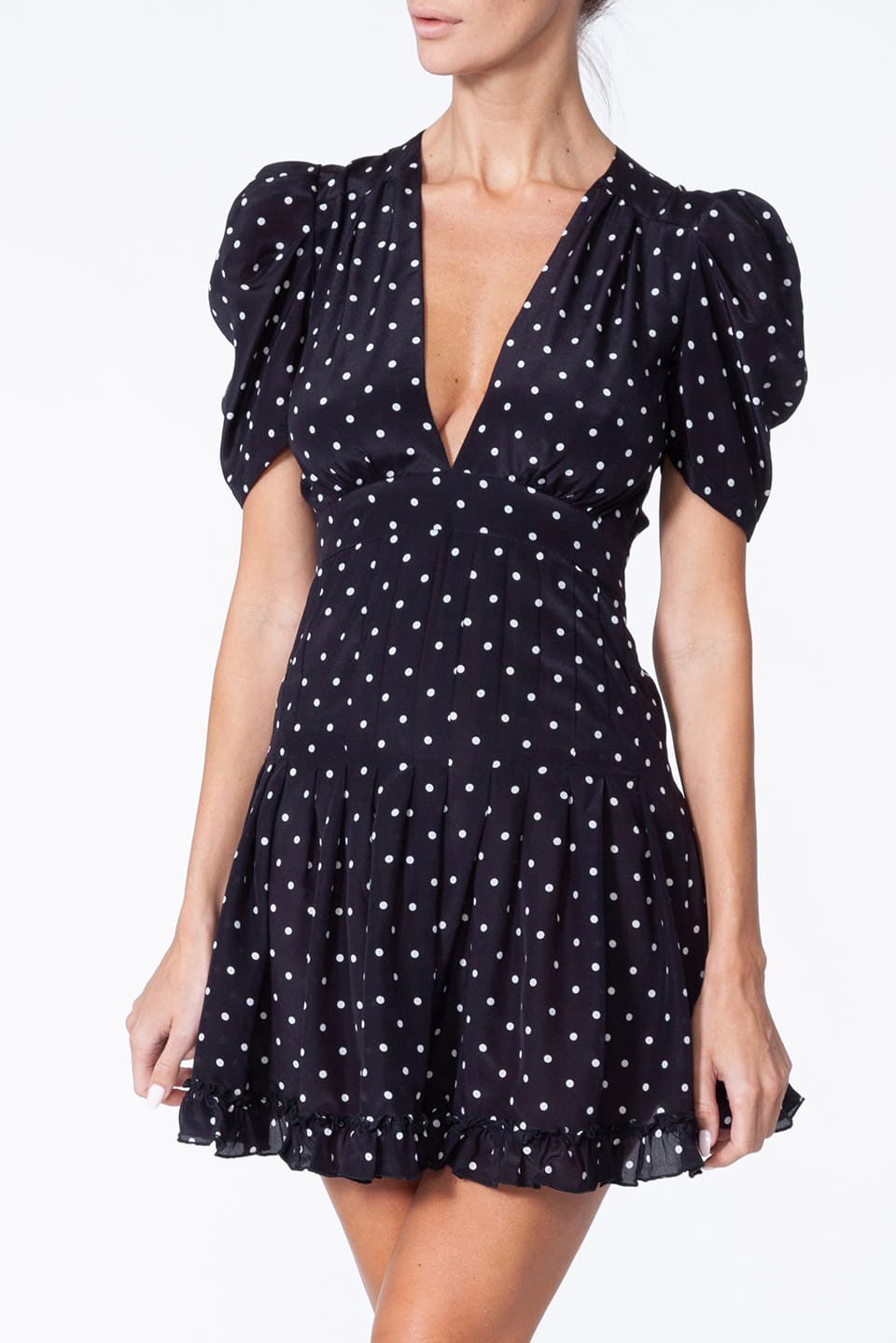 Fashion designer Anze's Black Silk mini dress with polka dots. Zoom on material details