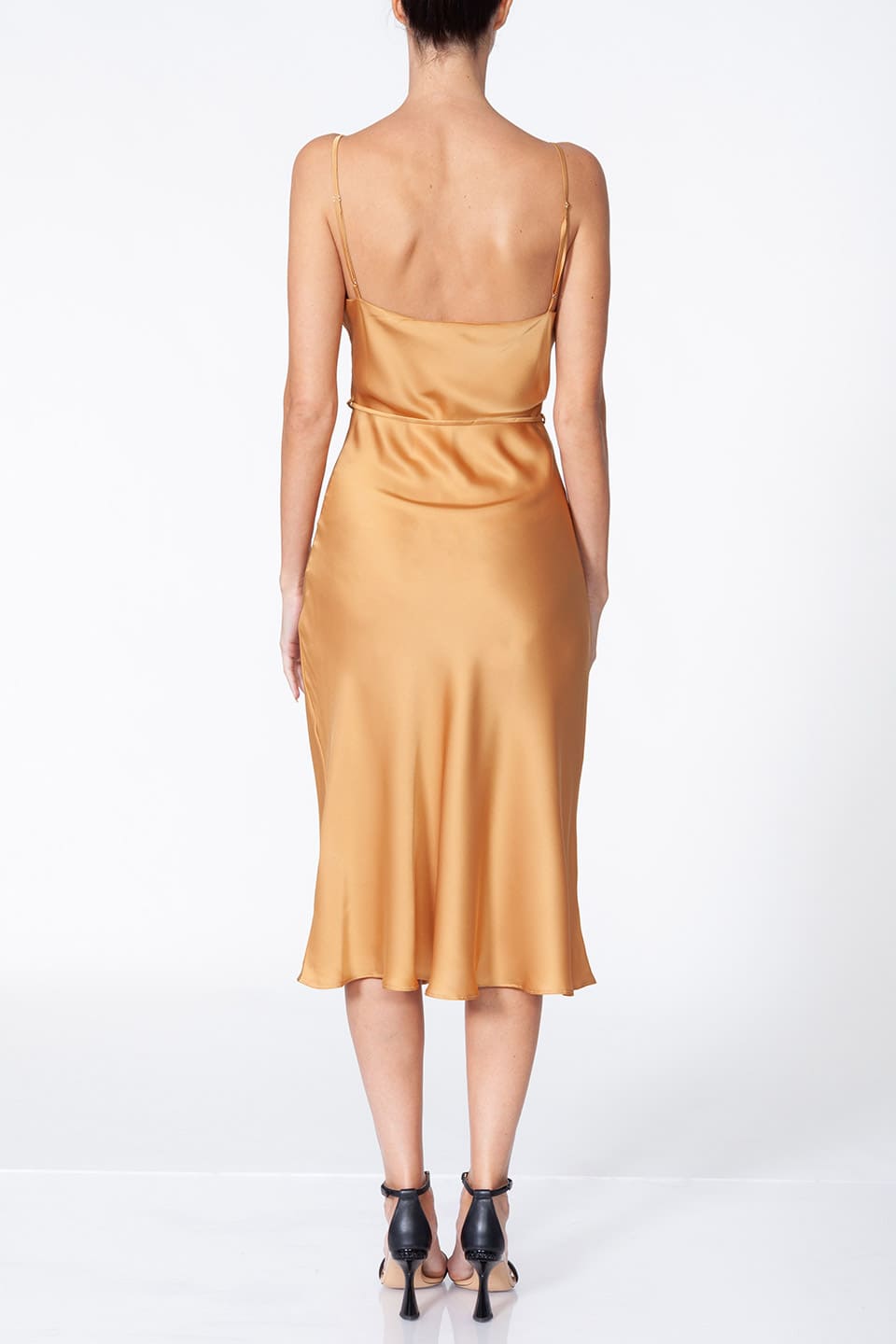 Fashion Stylist Anze's gold midi dress full-body view from behind