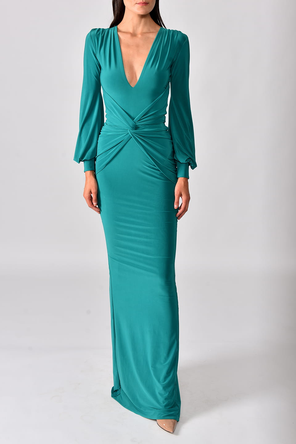 Thumbnail for Product gallery 1, Model wearing emerald green dress with long sleeves from Hamel fashion stylist, posing for front view