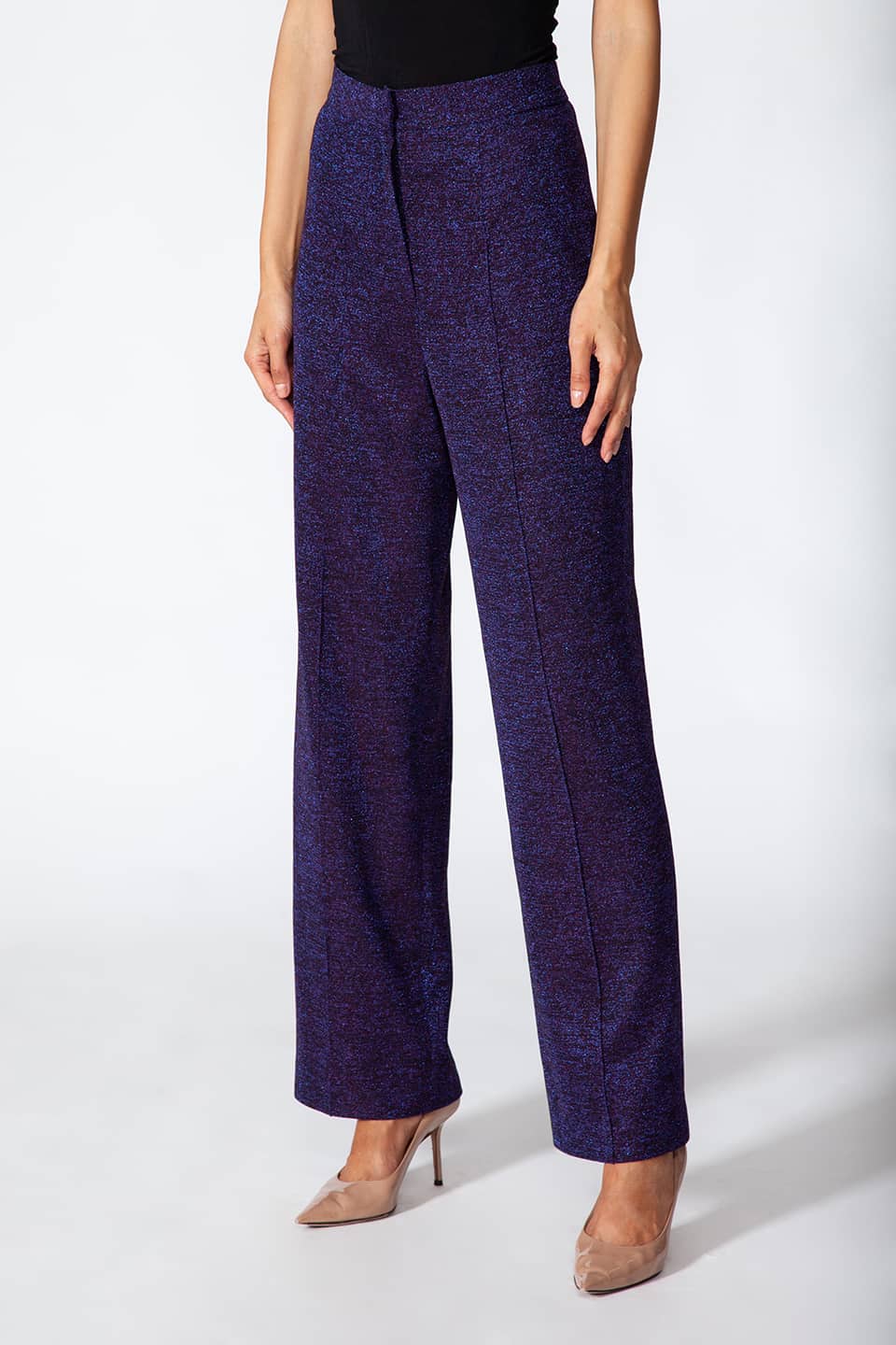 Model showing front - side details of Stylist Kukhareva London trousers, with wide leg pants with pressed creases and a hight-rise waist in Purple Color