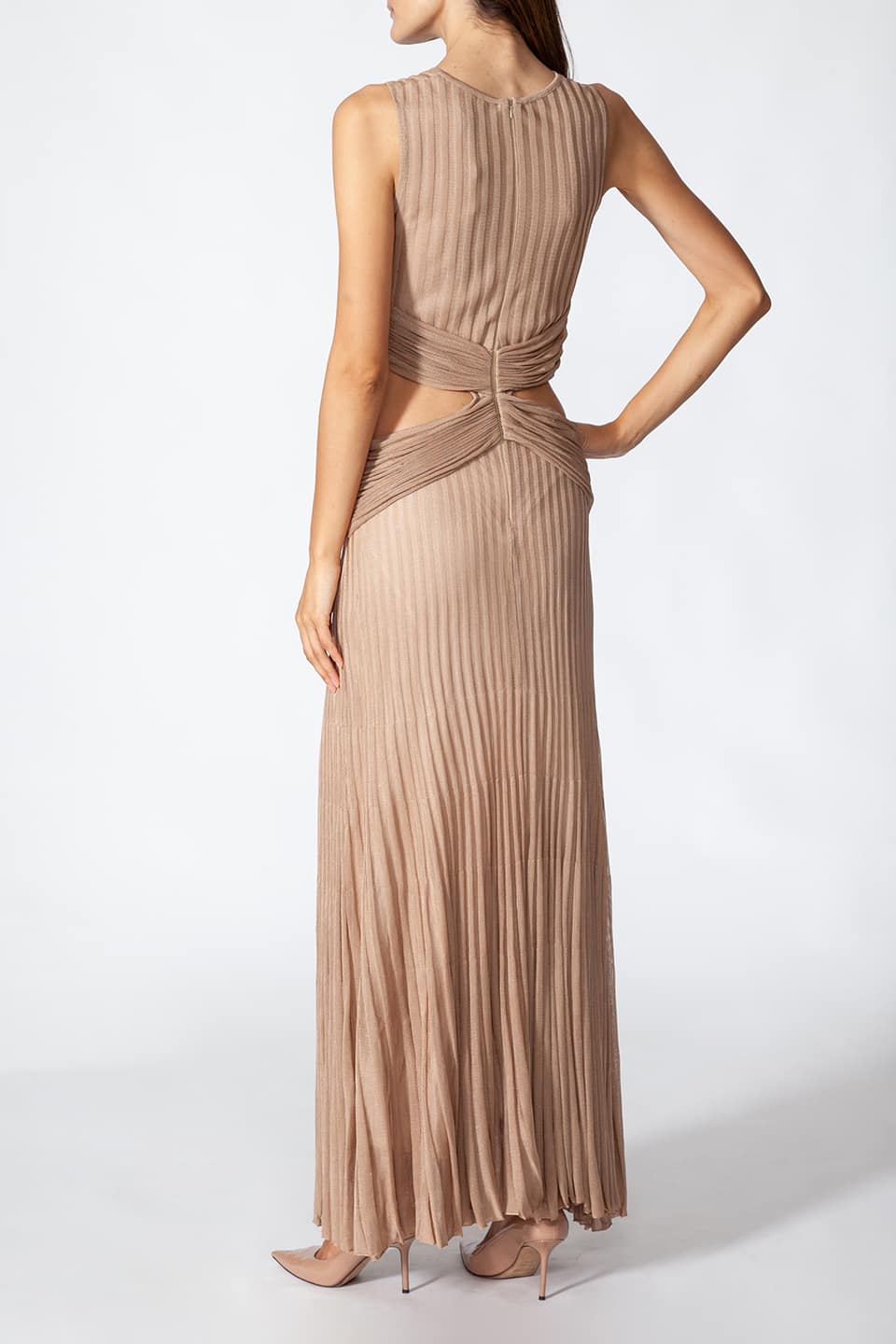 Thumbnail for Product gallery 6, Model in pose from behind wearing Fashion Stylist Kukhareva London's elegant gold dress. Long evening dress crafted from gold viscose blend featuring round neckline.