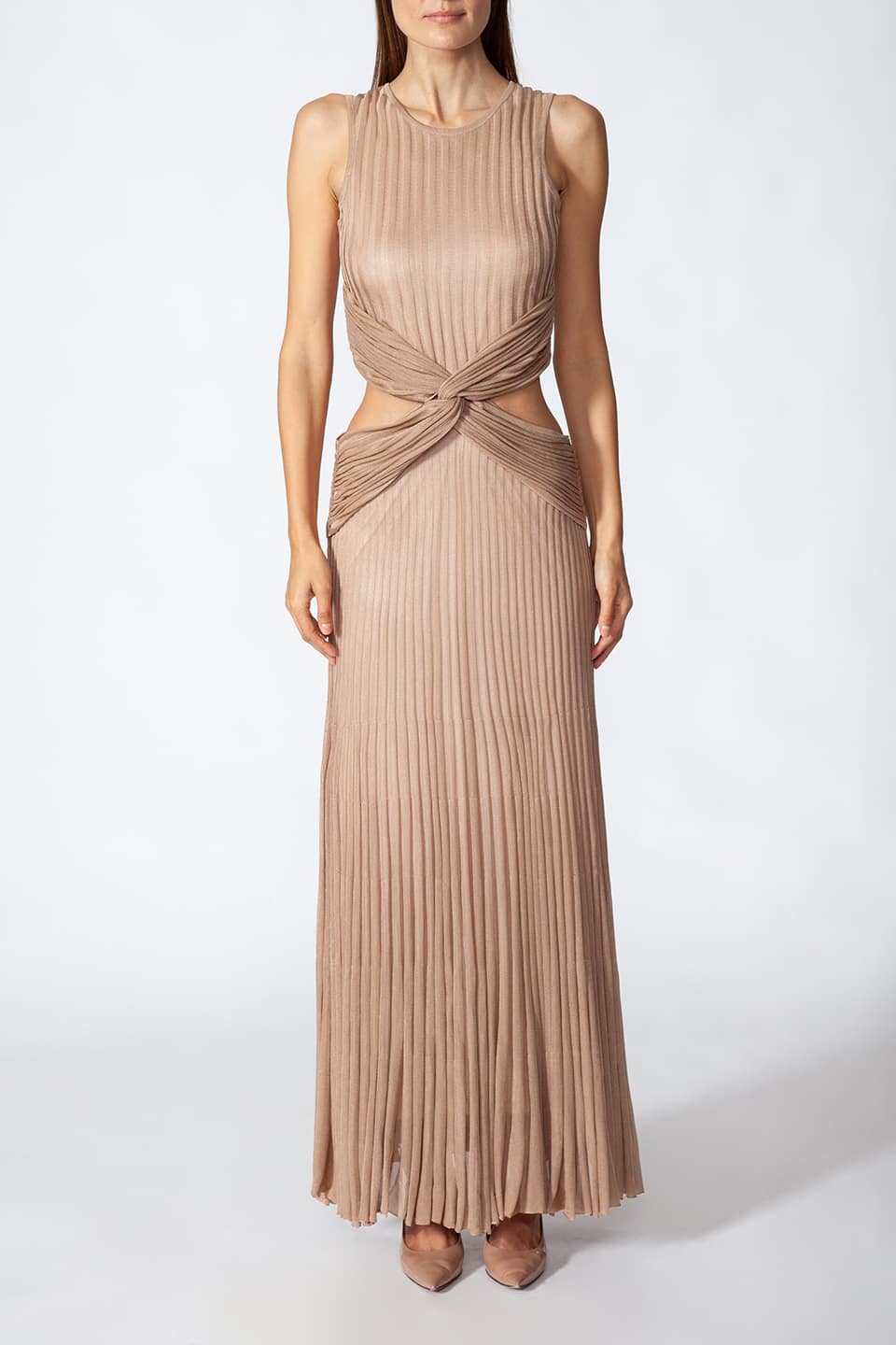 Model in frontal pose wearing Fashion Stylist Kukhareva London's elegant gold dress. Long evening dress crafted from gold viscose blend featuring round neckline.. Product gallery 1