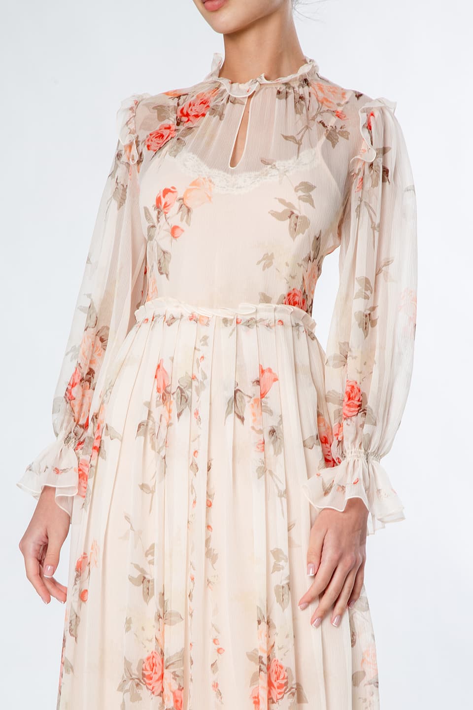 Fashion designer Vilshenko's midi dress in peach pink color with detailed floral print