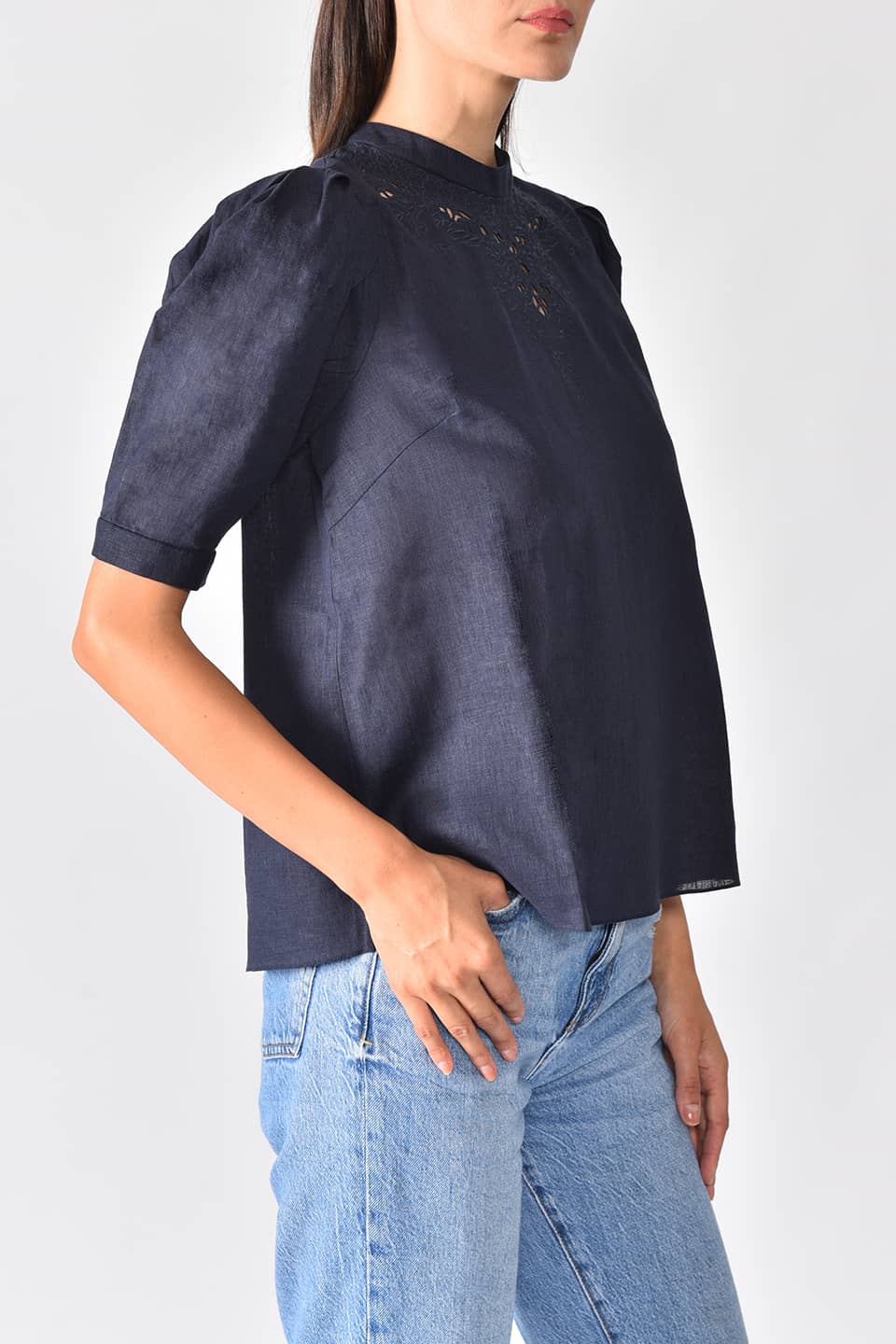 Thumbnail for Product gallery 5, Model wears navy linen top with floral cutout embroidery from stylist Vilshenko, posing from right side