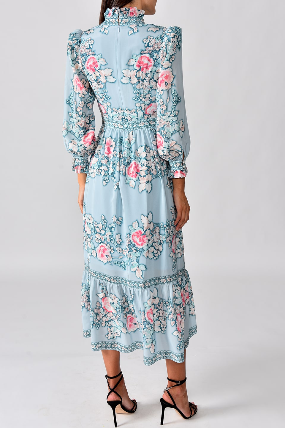 Thumbnail for Product gallery 2, Model wears silk midi dress in a pale blue floral print from stylist Vilshenko, posing from behind