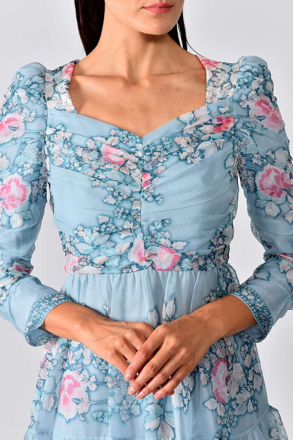 Thumbnail for Product gallery 5, Model wearing floral print silk chiffon tiered long dress in a pale blue color from stylist Vilshenho, texture details