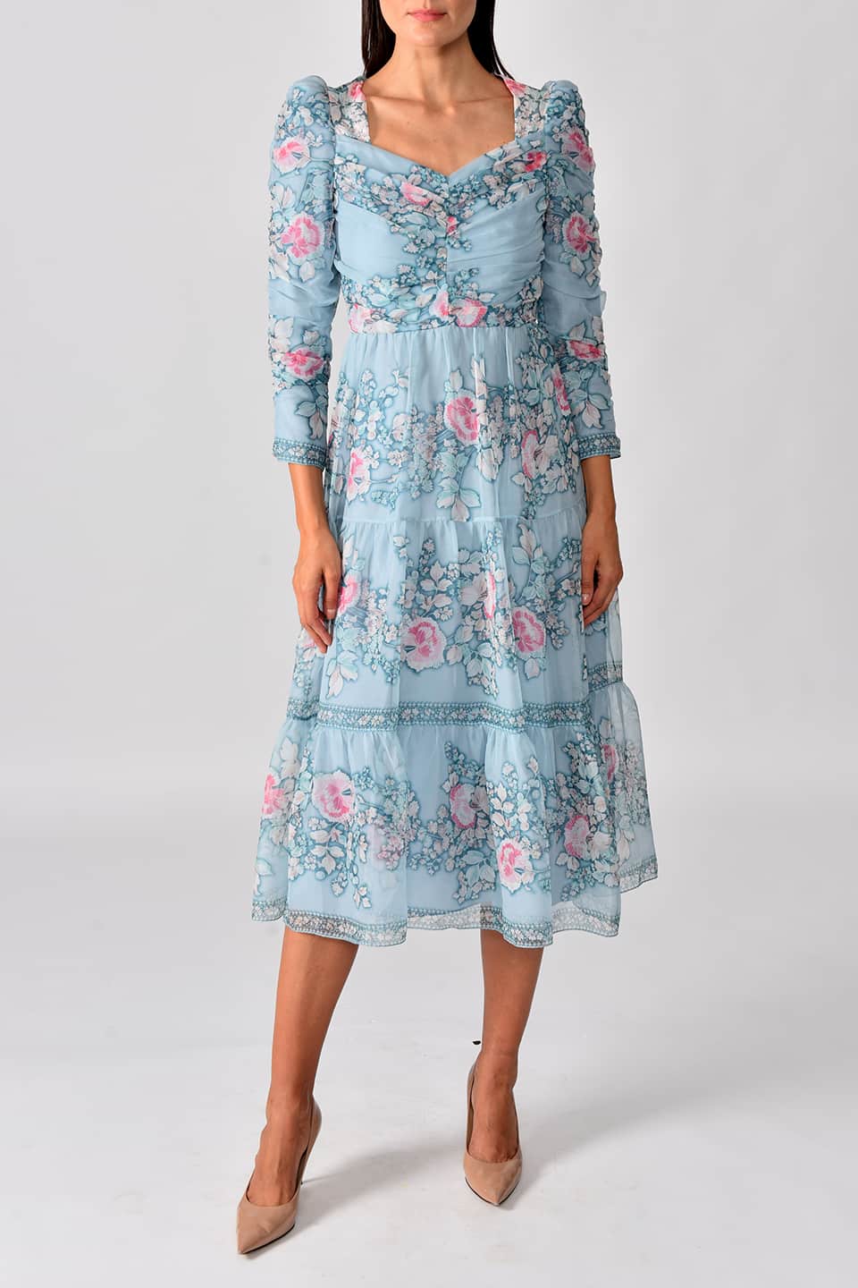 Thumbnail for Product gallery 1, Model wearing floral print silk chiffon tiered long dress in a pale blue color from stylist Vilshenho, posing in front view